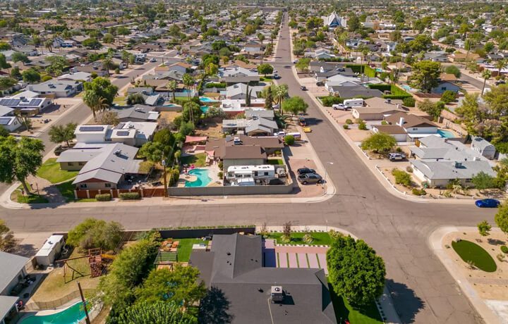 A view of houses and streets from above.